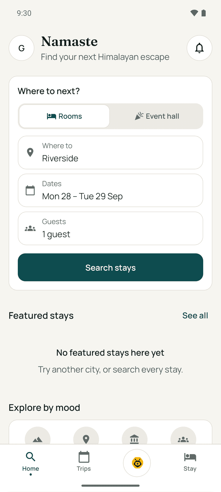 The Go app's home screen with the search card, featured stays and moods