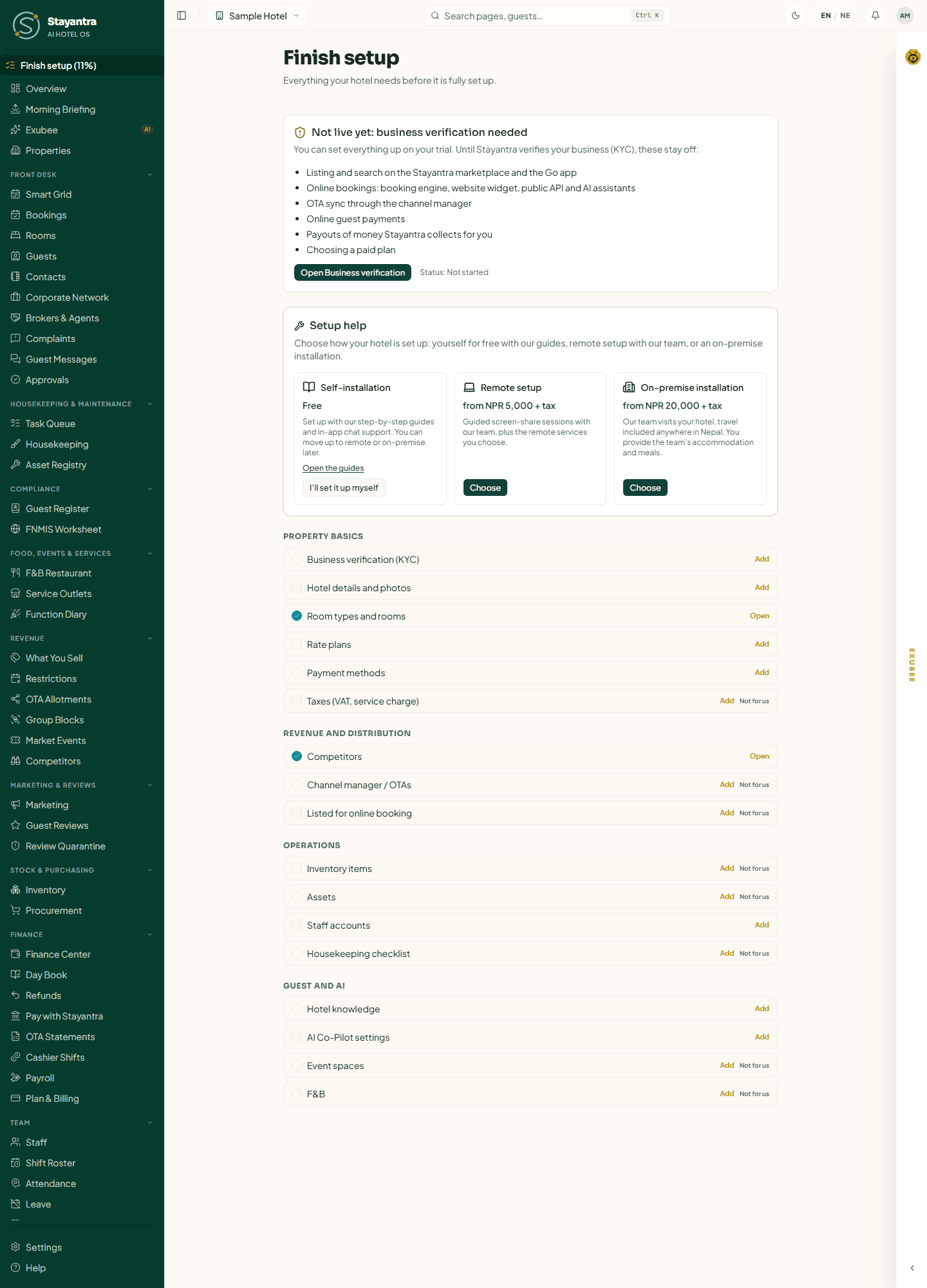 Finish setup for a newly launched hotel: the Not live yet card, Setup help, and the checklist grouped into Property basics, Revenue and distribution, Operations, and Guest and AI