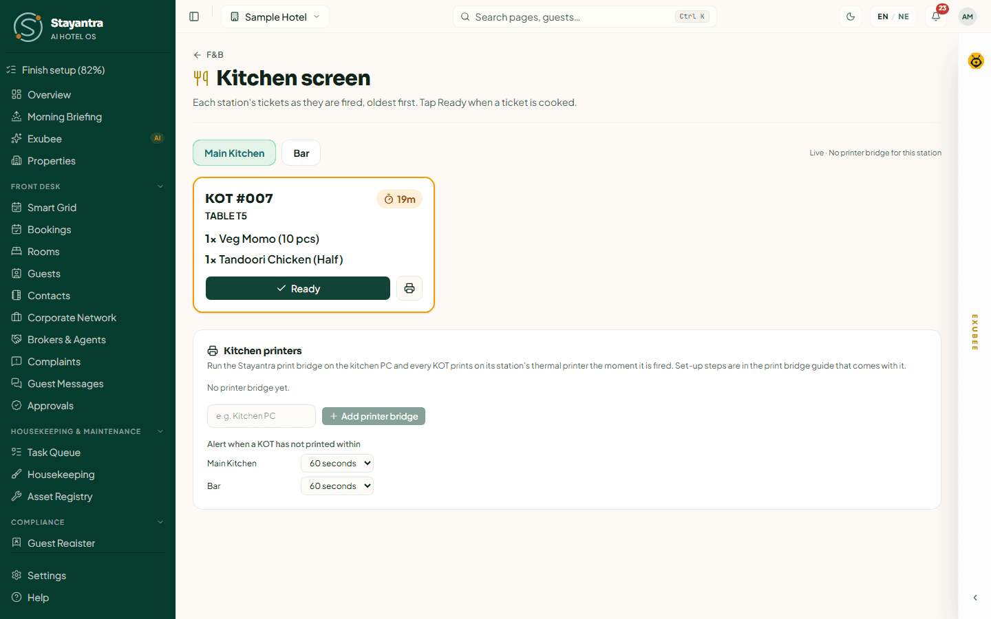 The Kitchen screen with its station buttons, the ticket board and the Kitchen printers card below